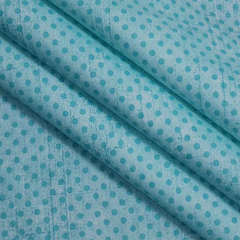 Flannel fabric in aqua with small polka dots