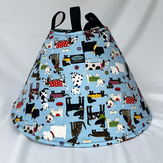 Soft Dog cone in blue flannel fabric with adjustable Velcro closure.