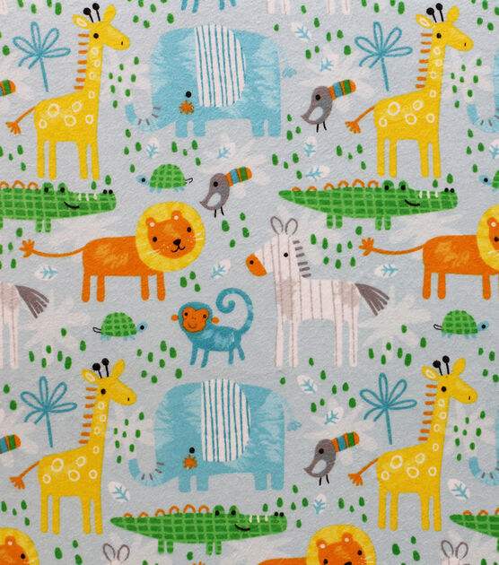 Zoo fabric featuring giraffes, elephants, lions, monkeys, birds, turtles and alligators